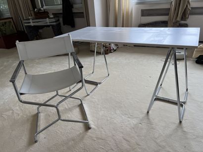 Suite of four tubular armchairs in steel...