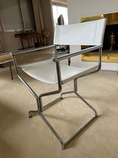 Suite of four tubular armchairs in steel...