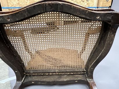 Pair of caned armchairs in molded and carved...