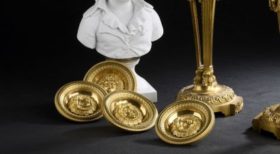 Suite of four Empire period chased and gilded...