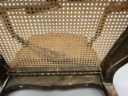 Pair of caned armchairs in molded and carved...