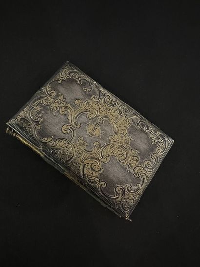 Notebook dated 1843, cover made of two silver...