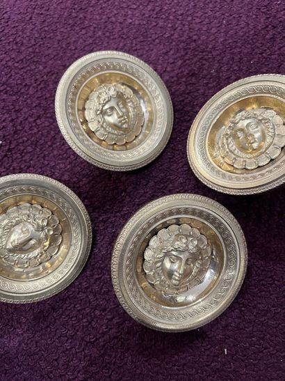 Suite of four Empire period chased and gilded...
