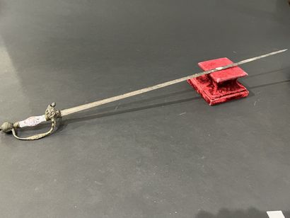 Sword with page ring. Earthenware rocket,...