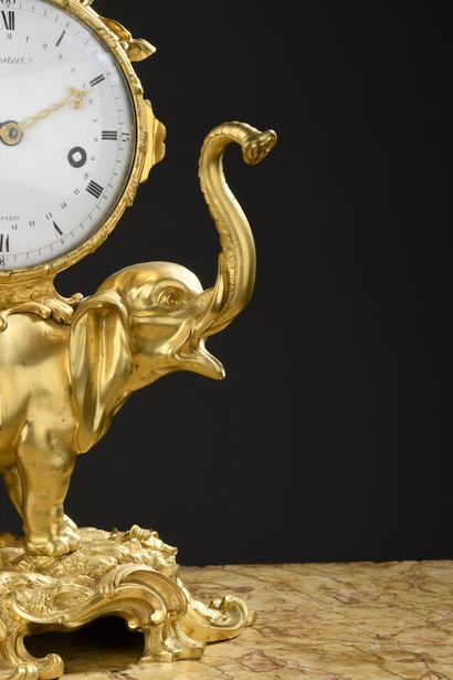 Chased and gilt bronze elephant clock signed...