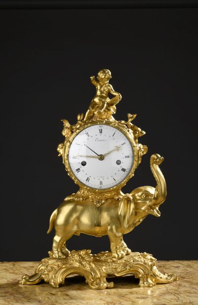 Chased and gilt bronze elephant clock signed...