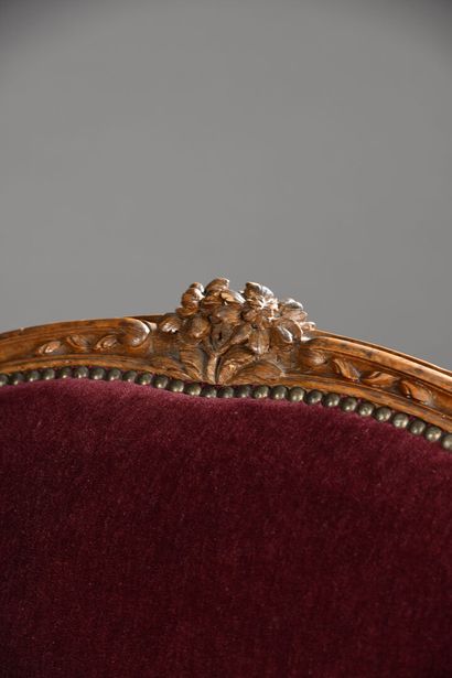 A molded and carved wood basket sofa, attributed...