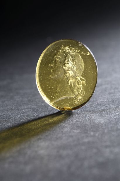 Yellow glass intaglio, Louis XV period
Representing...