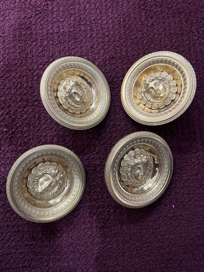 Suite of four Empire period chased and gilded...