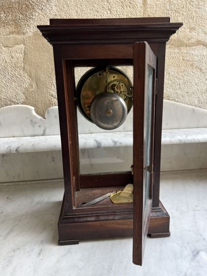 Cage clock in mahogany and mahogany veneer...