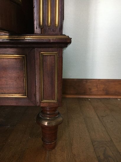 Mahogany and mahogany veneer showcase in...