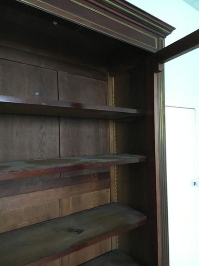 Mahogany and mahogany veneer showcase in...
