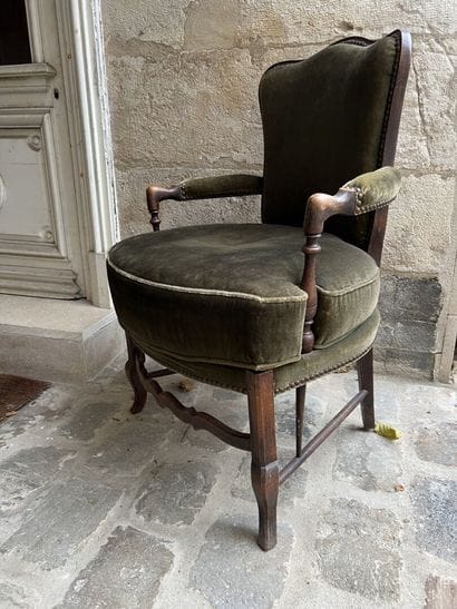 Armchair in natural wood upholstered with...