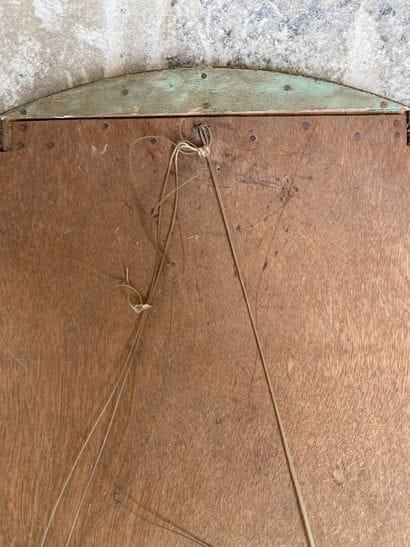 Circular glass decorated with two carved...