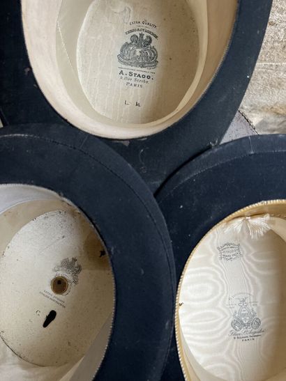 Three top hats contained in a hat case, circa...