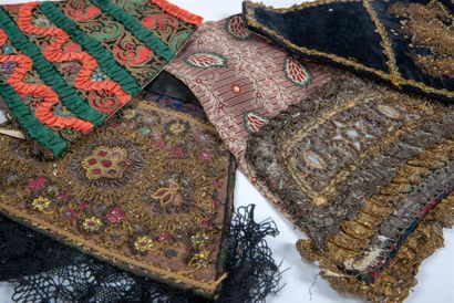Set of four ornate dress bibs, Alsace, 19th...