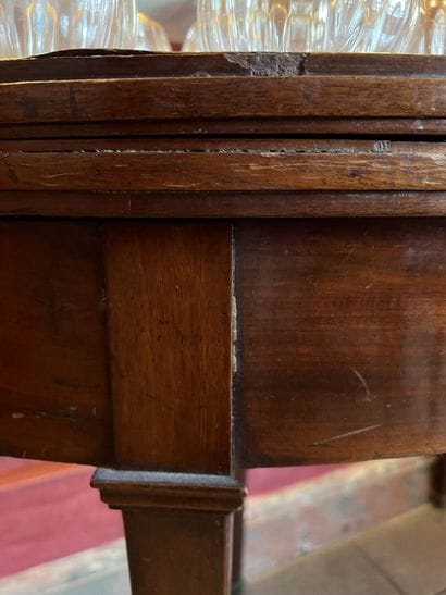 Mahogany and mahogany veneer half-moon table,...