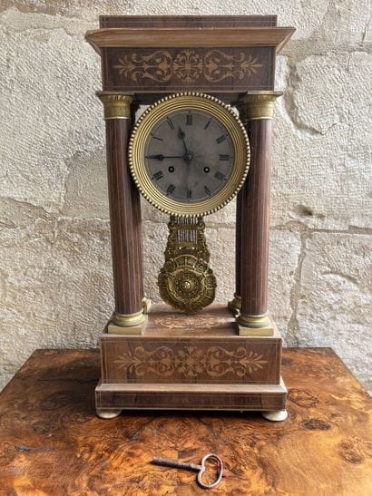 Portico clock of the Charles X period
Decorated...