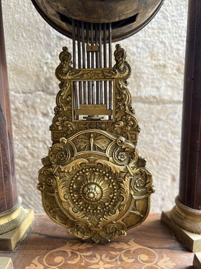 Portico clock of the Charles X period
Decorated...