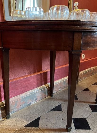 Mahogany and mahogany veneer half-moon table,...