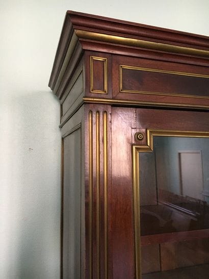 Mahogany and mahogany veneer showcase in...