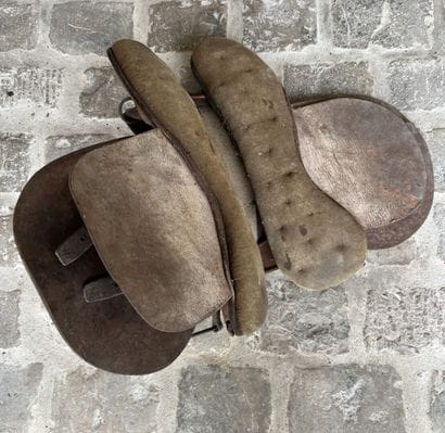 Cavalry saddle, brown leather. ABE (stains)

Two...