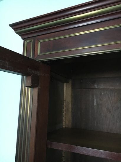 Mahogany and mahogany veneer showcase in...