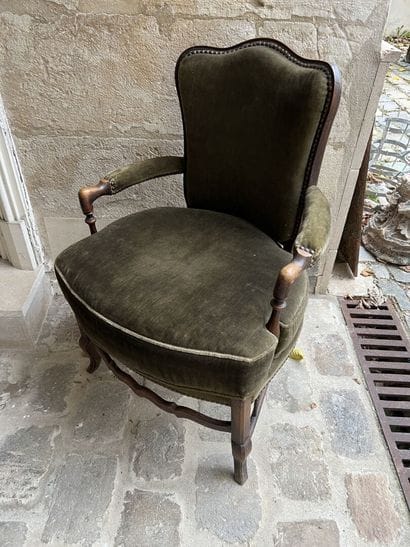 Armchair in natural wood upholstered with...