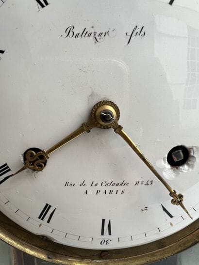 Cage clock in mahogany and mahogany veneer...