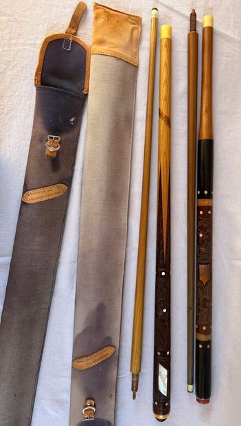 Two billiard cues, CARO in Paris
Carved wood...