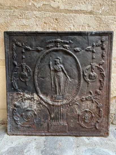 19th century fireback with Athena design
Cracks.
54...