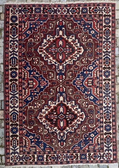 PERSIA 
Wool carpet decorated with flowers...