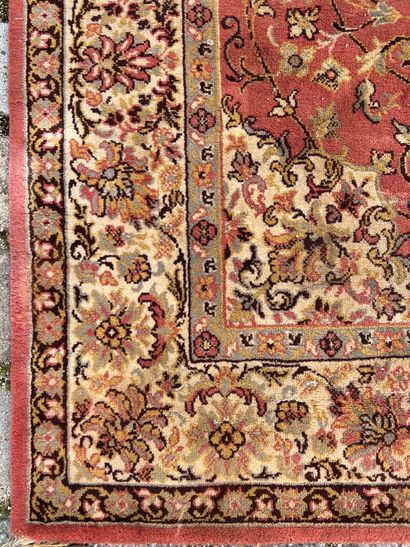Wool carpet on red background 
280 x 197...