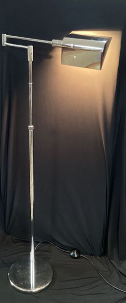 Chrome-plated steel reading lamp.
Height-adjustable...