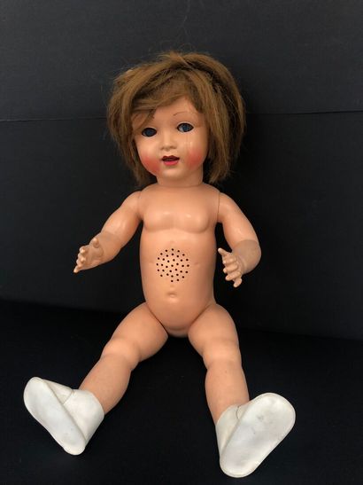 RAYNAL :
POUPEE en matière plastique.
La...