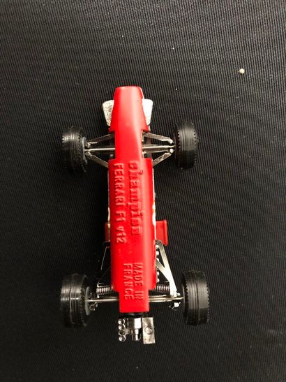Red Ferrari F1 n°10, Brands Hatch.
Driver...