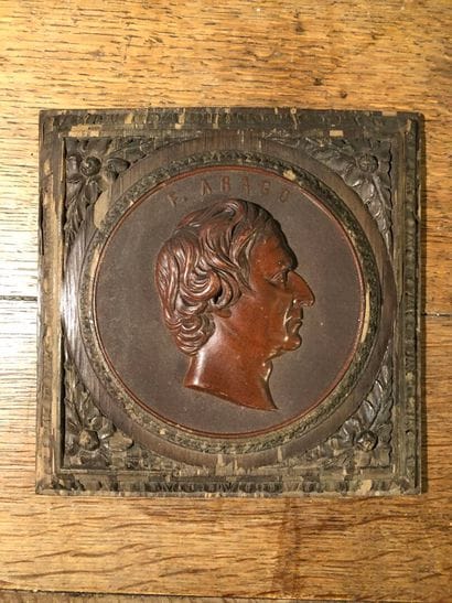 Bas relief in wood and pressed bakelite depicting...