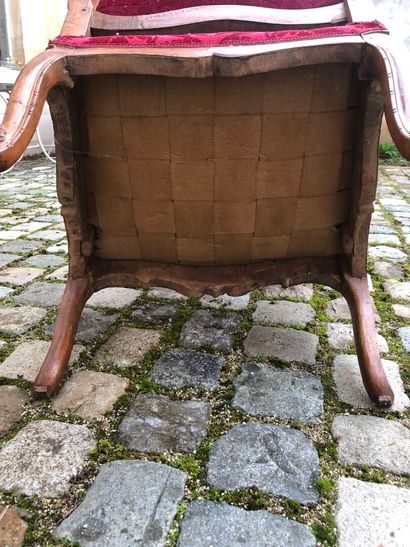 Pair of molded and carved wooden armchairs...