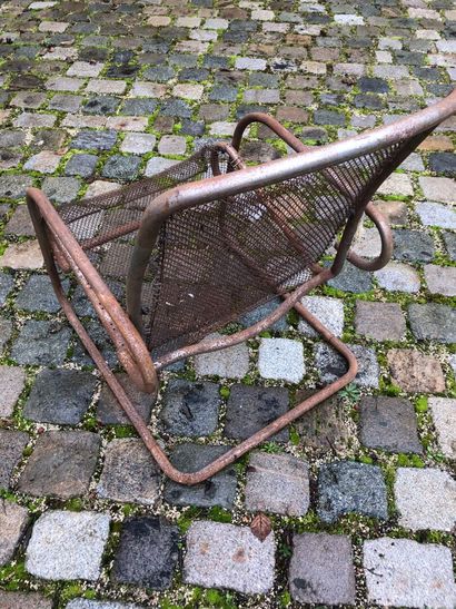 Chrome-plated tubular modernist armchair...