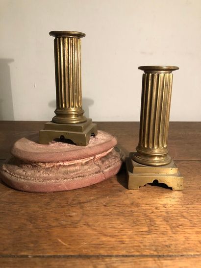 Pair of Louis XVI style candlesticks in chased...