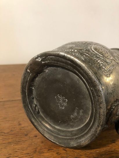 Pewter pitcher decorated with fleurs-de-lis...