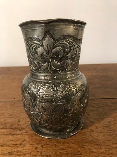 Pewter pitcher decorated with fleurs-de-lis...