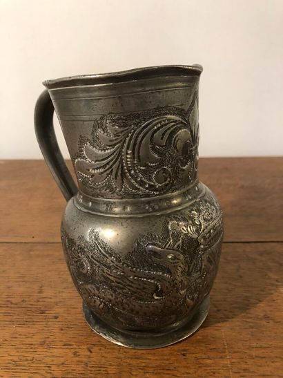 Pewter pitcher decorated with fleurs-de-lis...