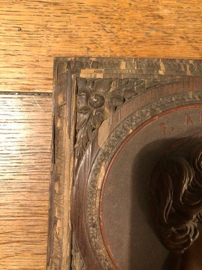 Bas relief in wood and pressed bakelite depicting...