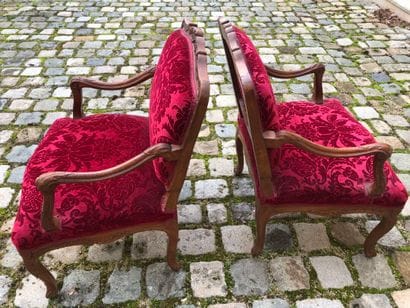 Pair of molded and carved wooden armchairs...
