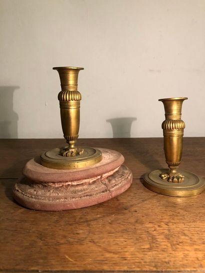 Pair of chased gilt bronze candlesticks,...