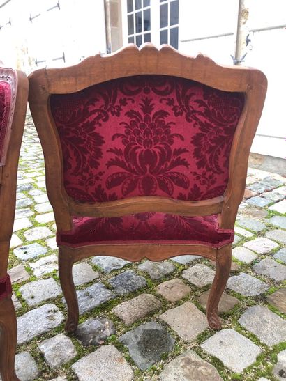 Pair of molded and carved wooden armchairs...
