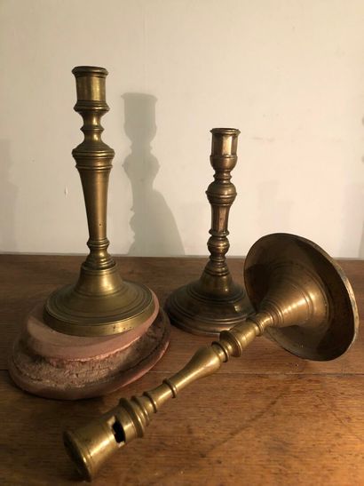 Set of three 18th century bronze candlesticks
H....