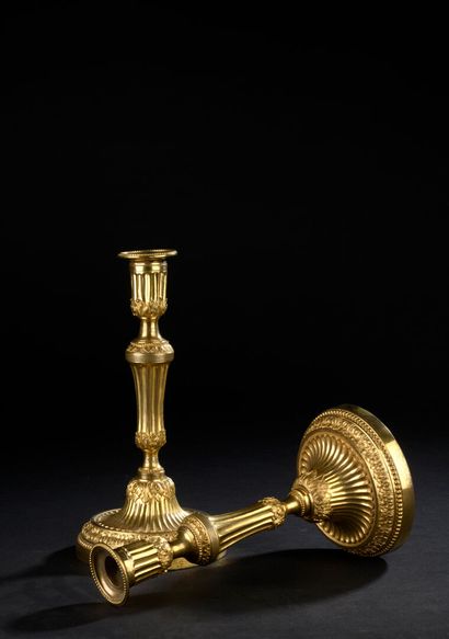 Pair of chased gilt bronze candlesticks from...