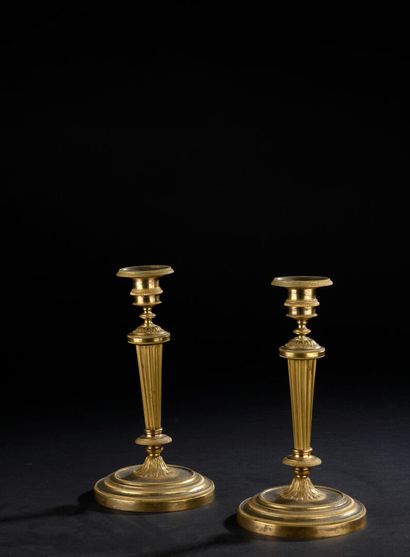 Pair of chased and gilt bronze candlesticks,...